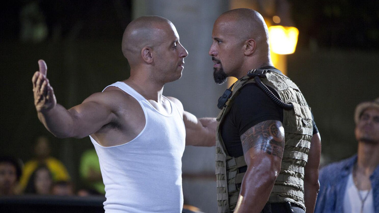 Vin Diesel and Dwayne Johnson as Dominic Toretto and Luke Hobbs, squaring off in Fast Five