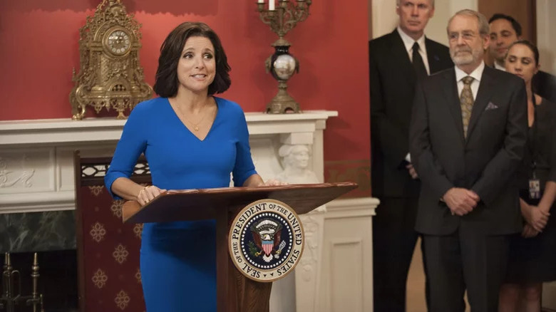 Veep's Selina Meyer standing at podium 