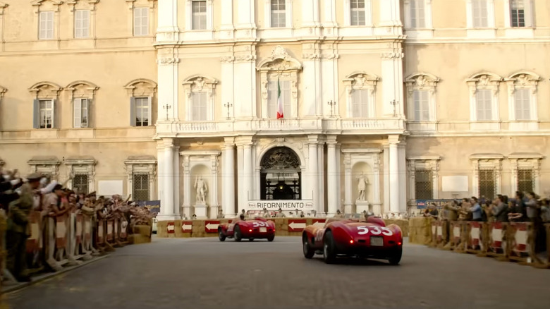 Cars racing in city