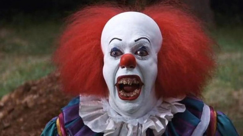 Pennywise the Clown (Tim Curry) in the 1990 It miniseries