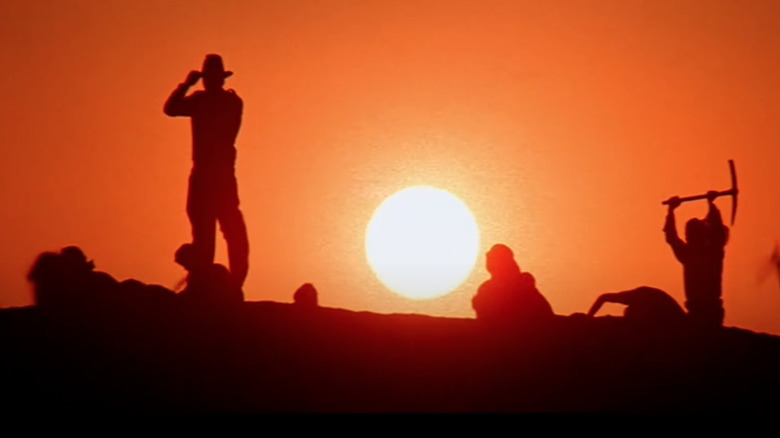 Raiders of the Lost Ark, people digging at sunset