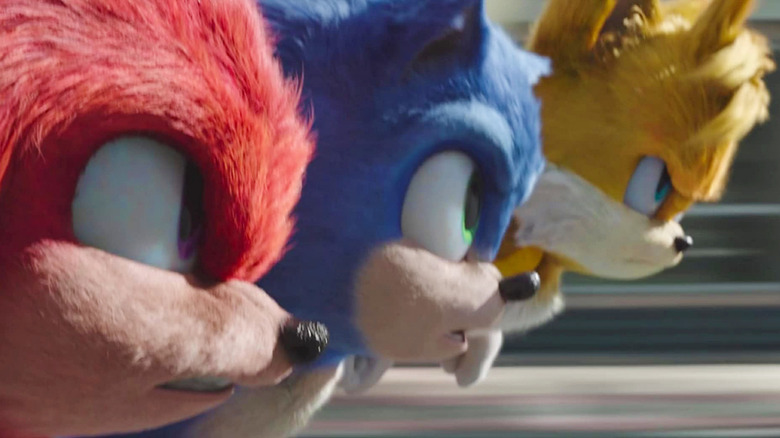 Knuckles, Sonic e Tails correndo muito rápido em Sonic the Hedgehog 3