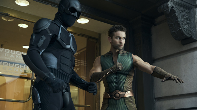 Nathan Mitchell as Black Noir and Chace Crawford as the Deep striking a fighting pose in The Boys