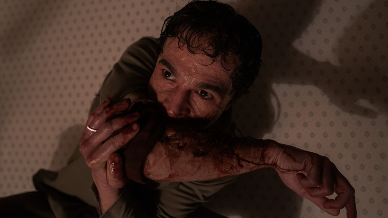 Christopher Abbott as Blake undergoing a painful and bloody transition in Wolf Man