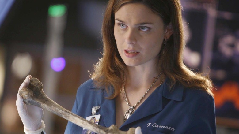 Bones, Emily Deschanel holding bone