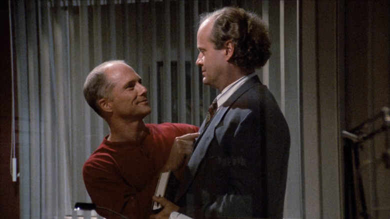 Bulldog points to Frasier's chest in the KACL studio