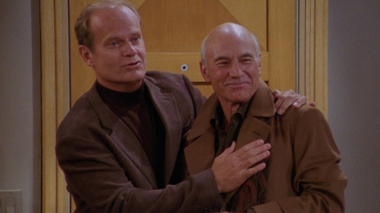 Kelsey Grammer as Frasier Crane with his arm around Patrick Stewart as Alistair Burke in Frasier