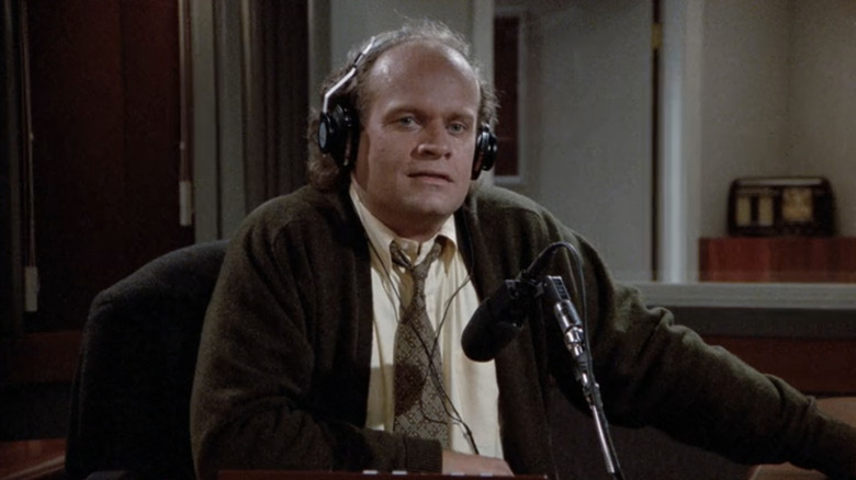 Kelsey Grammer's Frasier Crane delivers his talk radio show from behind a microphone in Frasier