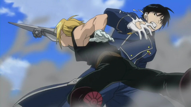 Edward Elric slices Roy Mustang's glove with his automail arm blade in Fullmetal Alchemist