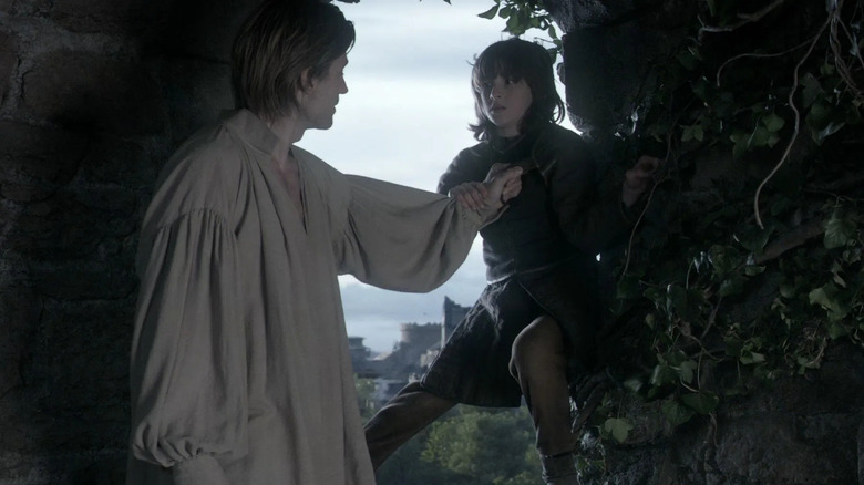 Jaime pushing Bran out of a window on Game of Thrones