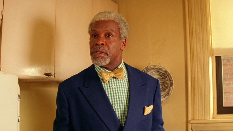 Henry Sherman (Danny Glover) looks tensely at someone offscreen