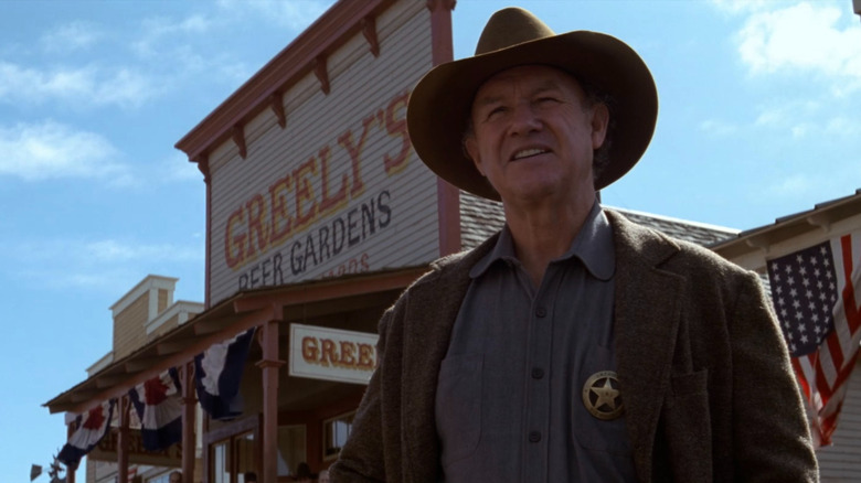 "Little Bill" standing in front of Greely's in Unforgiven