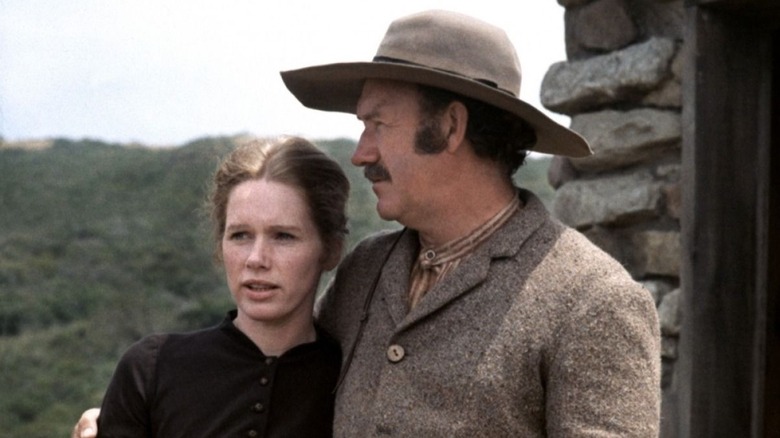 Gene Hackman as Zandy Allan embraces Liv Ullman as Hannah Lund in Zandy's Bride