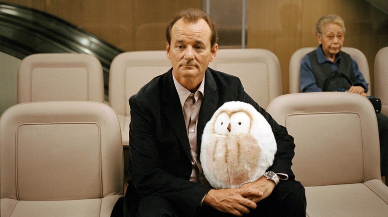 Bill Murray sitting with stuffed owl Lost in Translation