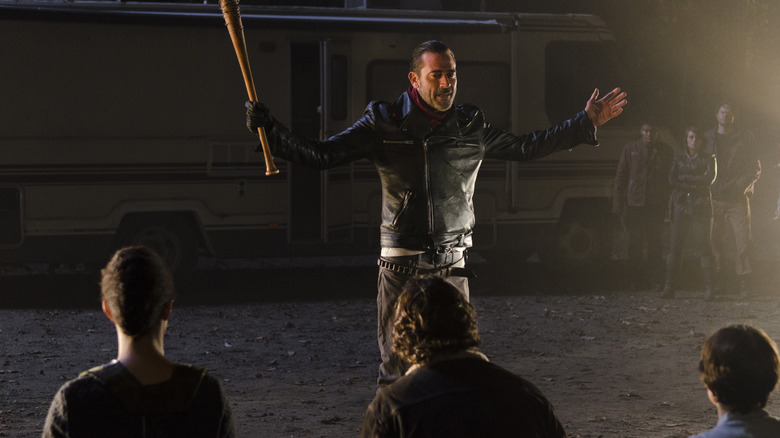 Jeffrey Dean Morgan's Negan standing in front of his potential victims in The Walking Dead episode Last Day on Earth