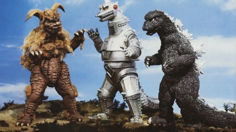 King Caesar, Mechagodzilla, and Godzilla debating where to have dinner