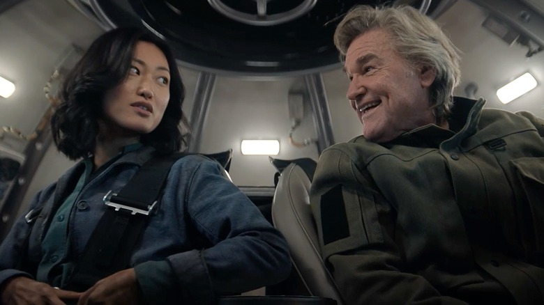 Keiko (Mari Yamamoto) sits with Lee Shaw (Kurt Russell) in Monarch: Legacy of Monsters