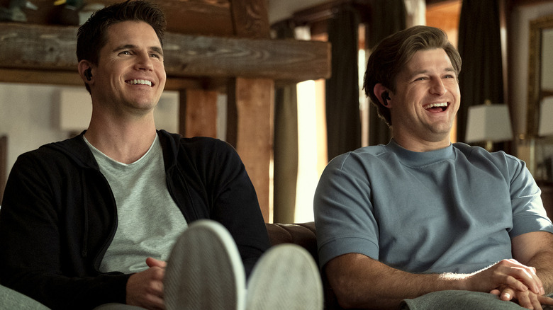 Kevin Bigley and Robbie Amell in Upload
