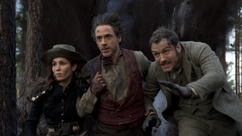 Noomi Rapace, Robert Downey Jr. and Jude Law in "Sherlock Holmes: A Game of Shadows."