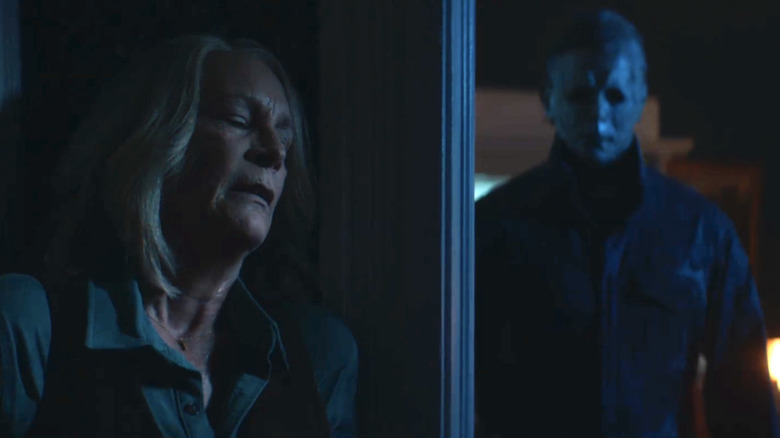 Laurie Strode hiding from Michael Myers in Halloween Ends