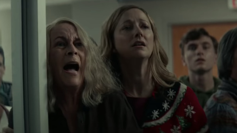 Jamie Lee Curtis and Judy Greer in terror as Laurie Strode and Karen Nelson in Halloween Kills