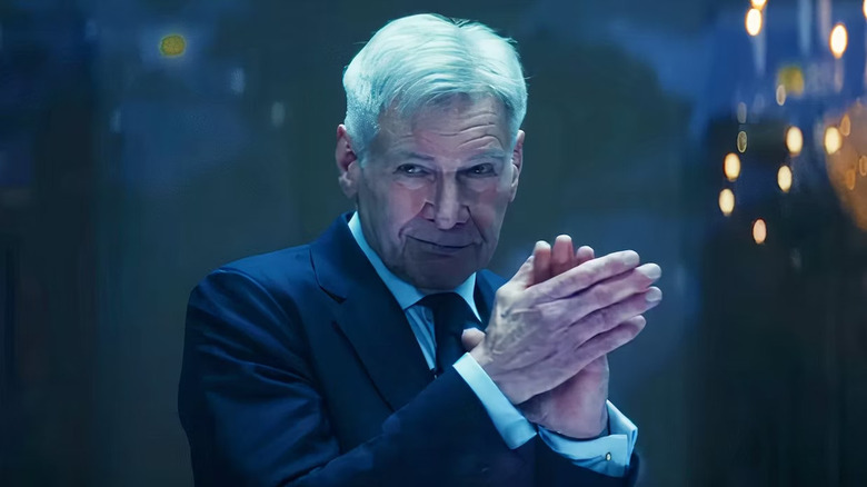 President Ross smiles and catches his hands together in Captain America: The brave new world