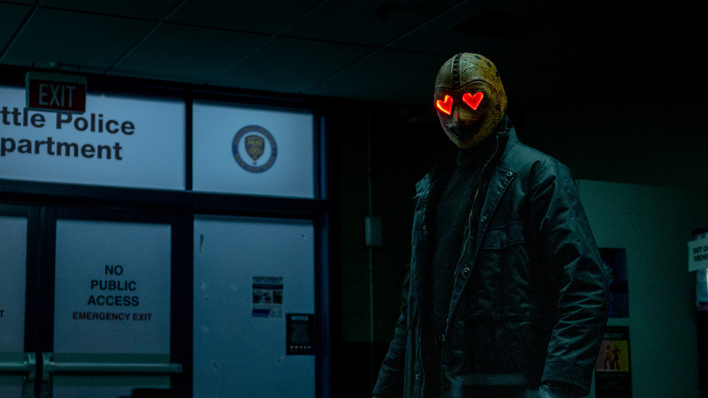 The Heart Eyes killer stands in the police station