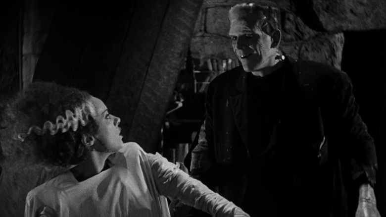 The Bride looking up at Frankenstein's Monster in Bride of Frankenstein