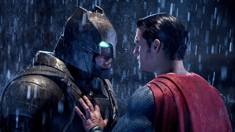 Batman and Superman face off in the rain