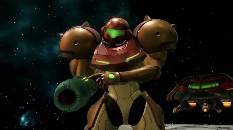 Samus's tapping buttons on hand cannon with a gun in the background