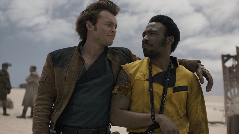 Han Solo putting his arm around Lando Calrissian