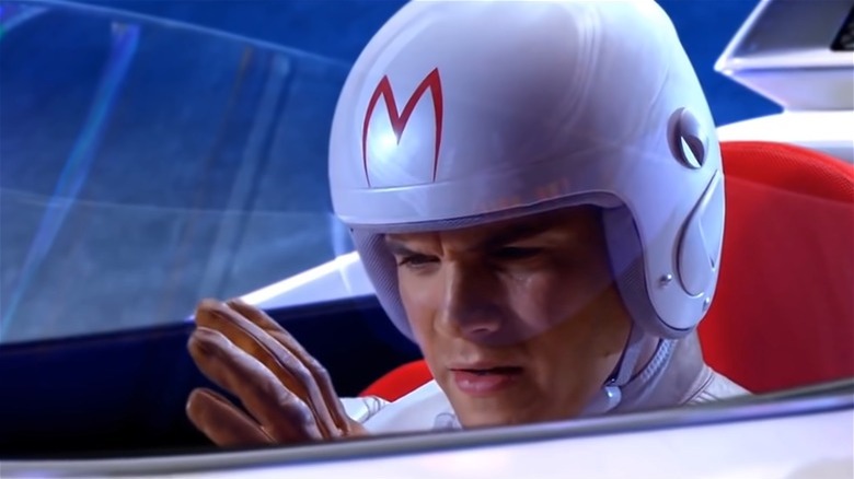 Speed Racer sitting in car