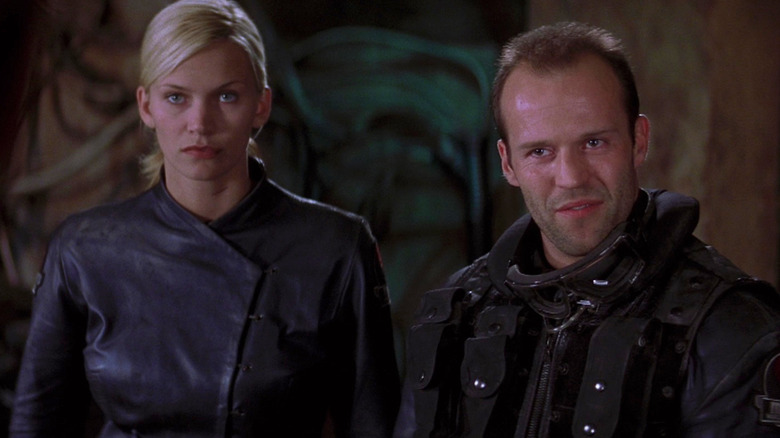 Natasha Henstridge in the role of Lieutenant Melanie Ballard and Jason Stem as Sergeant Jericho Butler, who make funny expression in Mars's ghosts