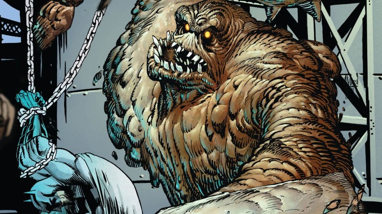 Clayface swinging at Batman in the Batman comic books