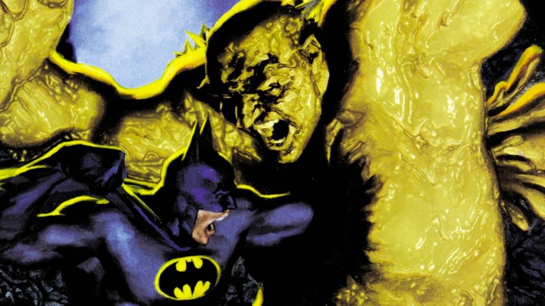 Batman punching through Clayface in DC's comic books