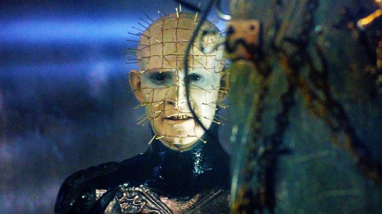 Pinhead pleased with his victim in Hellraiser