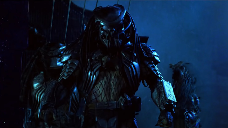 Three Predators from the movie "Alien Vs. Predator."