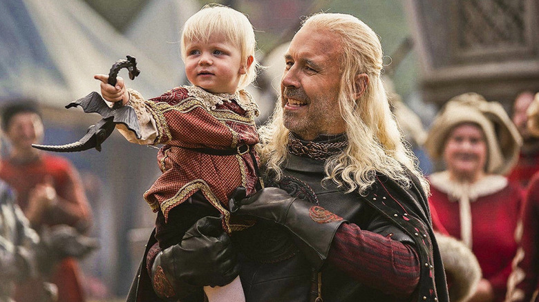 Baby Prince Aegon and King Viserys in House of the Dragon