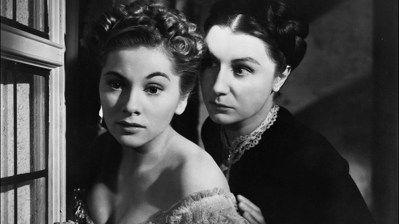 Judith Anderson and Joan Fontaine looking intense