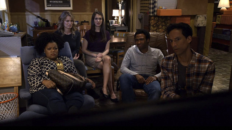 Cast of Community on the couch