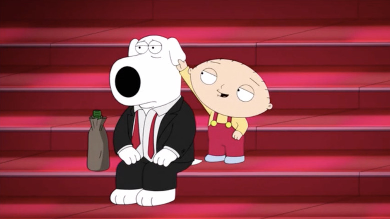 Family Guy Brian Griffin sad and drinking petted by Stewie Griffin