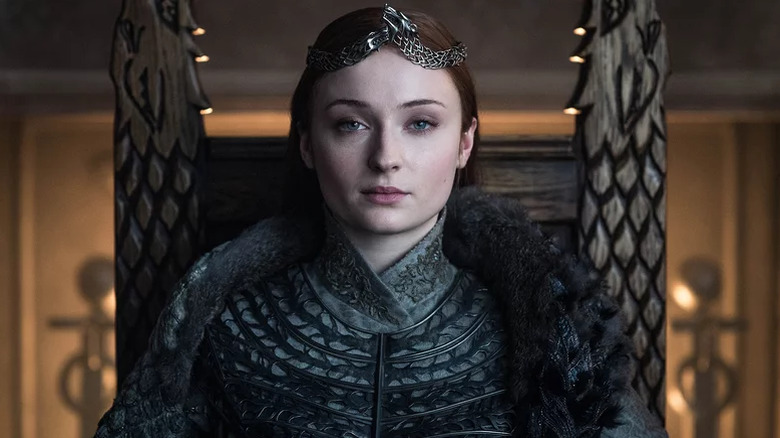 Sansa sitting on the throne as the new Queen of the North in Game of Thrones