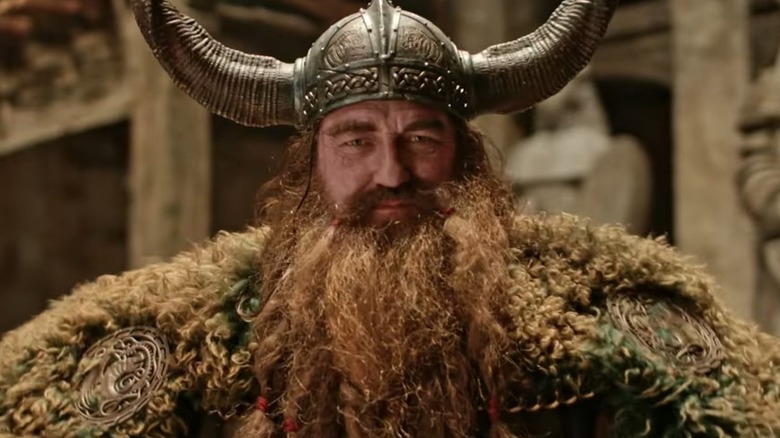 Gerard Butler's Stoick standing in Berk in the live-action How to Train Your Dragon