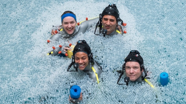 Kate Winslet, Zoe Saldaña, Cliff Curtis, and Sam Worthington in Avatar: The Way of Water