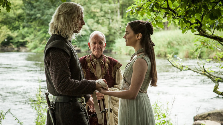 Rhaegar and Lyanna holding hands during their wedding ceremony on Game of Thrones