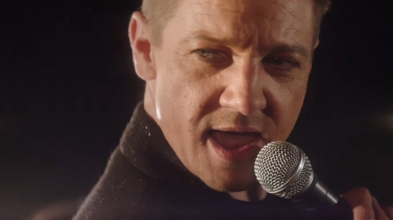 Jeremy Renner in the music video for Main Attraction