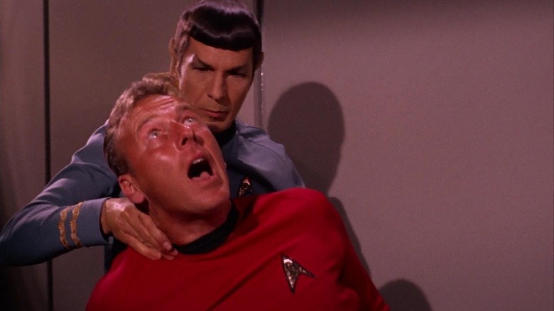 Spock pinching the neck of a security officer on "Star Trek."