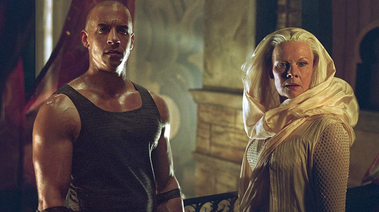 Vin Diesel and Judi Dench in The Chronicles of Riddick