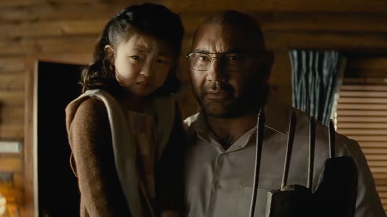 Kristen Cui and Dave Bautista in Knock at the Cabin