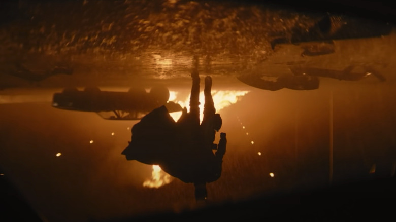 The iconic upside-down Batman shot.